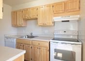 Thumbnail 9 of 12 - Kitchen with appliances at Chatham West Apartments, Brockton, MA