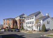 Thumbnail 5 of 9 - Exterior Of Building With Front Yard And Driveway Southwood Apartments.