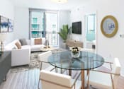 Thumbnail 32 of 36 - Living room with white furniture  at Douglas Enclave located in Miami, Florida