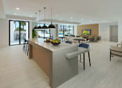 Thumbnail 7 of 15 - A modern kitchen with a dining area in the background.