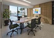 Thumbnail 16 of 17 - A conference room with a large table and chairs.