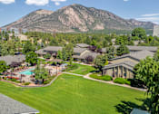 Thumbnail 19 of 34 - A mountain is in the background of a residential area.