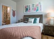 Thumbnail 20 of 32 - a bedroom with a bed and two night stands