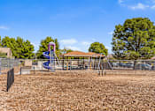 Thumbnail 18 of 22 - Dog park with agility fixtures at Rio Verde Apartments.