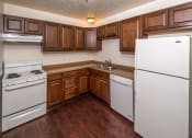 Thumbnail 11 of 32 - Fully Equipped Kitchen With Modern Appliances at Rio Verde Apartments, Cottonwood, 86326