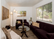 Thumbnail 8 of 27 - Living Room With Expansive Window at Country Club Terrace Apartments, Arizona, 86004