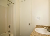 Thumbnail 5 of 27 - Renovated Bathrooms With Quartz Counters at Country Club Terrace Apartments, Arizona, 86004