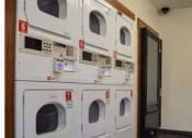 Thumbnail 15 of 27 - Laundry Room at Country Club Terrace Apartments, Flagstaff, AZ, 86004