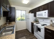 Thumbnail 2 of 27 - Fully Equipped Kitchen at Country Club Terrace Apartments, Flagstaff, AZ