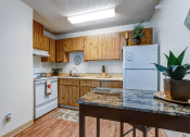 Thumbnail 15 of 31 - Chef-Inspired Kitchens at Pine View Village Apartments, Flagstaff, Arizona