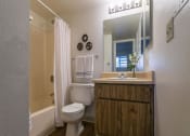 Thumbnail 3 of 31 - Bathroom With Vanity Lights at Pine View Village Apartments, Arizona