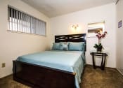 Thumbnail 7 of 31 - Spacious Bedroom With Comfortable Bed at Pine View Village Apartments, Flagstaff, 86001
