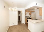 Thumbnail 29 of 36 - Spacious Kitchen With Pantry Cabinet at University Square Apartments, Flagstaff, Arizona