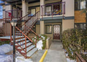 Thumbnail 33 of 36 - Backyard View With Staircase at University Square Apartments, Flagstaff, AZ