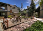 Thumbnail 20 of 36 - Courtyard Sitting Area at University Square Apartments, Flagstaff