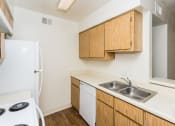 Thumbnail 12 of 36 - Fully Furnished Kitchen at University Square Apartments, Flagstaff, 86001