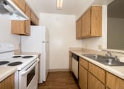 Thumbnail 13 of 36 - Efficient Appliances In Kitchen at University Square Apartments, Arizona