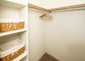 Thumbnail 13 of 56 - Generous Walk-In Closets With Shelving at Woodlands Village Apartments, Flagstaff