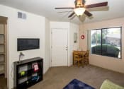 Thumbnail 18 of 56 - Modern Living Room at Woodlands Village Apartments, Flagstaff, 86001