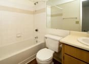 Thumbnail 1 of 56 - Bathroom With Bathtub at Woodlands Village Apartments, Arizona, 86001