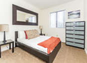 Thumbnail 23 of 56 - Comfortable Bedroom at Woodlands Village Apartments, Flagstaff, AZ, 86001