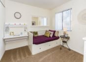 Thumbnail 24 of 56 - Small Bedroom With Workspace at Woodlands Village Apartments, Flagstaff, AZ
