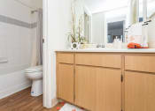 Thumbnail 3 of 56 - Modern Bathroom Fittings at Woodlands Village Apartments, Flagstaff, AZ