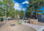 Thumbnail 46 of 56 - Outdoor Sitting Arrangements at Woodlands Village Apartments, Flagstaff, 86001