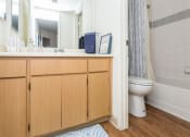 Thumbnail 4 of 56 - Spa Inspired Bathroom at Woodlands Village Apartments, Flagstaff, 86001