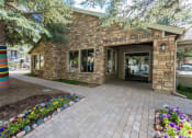 Thumbnail 50 of 56 - Clubhouse Exterior at Woodlands Village Apartments, Arizona, 86001