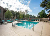 Thumbnail 53 of 56 - Pool View at Woodlands Village Apartments, Flagstaff, 86001