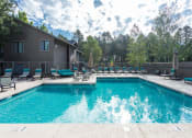 Thumbnail 55 of 56 - Relaxing Swimming Pool at Woodlands Village Apartments, Flagstaff