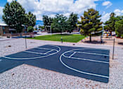 Thumbnail 2 of 22 - a basketball court with landscaping
