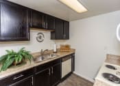Thumbnail 13 of 38 - Efficient Appliances In Kitchen at Country Club Meadows Apartments, Flagstaff, 86004