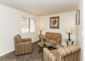 Thumbnail 16 of 38 - Expansive Living Room at Country Club Meadows Apartments, Arizona