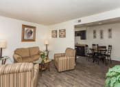 Thumbnail 17 of 38 - Living Room With Dining Area at Country Club Meadows Apartments, Arizona, 86004