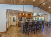 Thumbnail 28 of 38 - Eat-In Table With High Chairs In Clubhouse at Country Club Meadows Apartments, Flagstaff, AZ, 86004