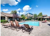 Thumbnail 30 of 38 - Poolside Sundeck And Grilling Area at Country Club Meadows Apartments, Arizona, 86004