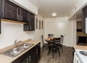 Thumbnail 6 of 38 - Well Equipped Kitchen And Dining at Country Club Meadows Apartments, Flagstaff, 86004