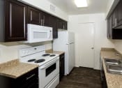 Thumbnail 8 of 38 - Stainless Steel Appliances Available at Country Club Meadows Apartments, Flagstaff, Arizona