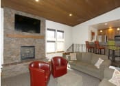 Thumbnail 19 of 27 - Fireplace Lounge at Country Club Terrace Apartments, Flagstaff, Arizona