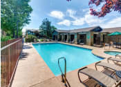 Thumbnail 21 of 27 - Pool Side Relaxing Area With Sundeck at Country Club Terrace Apartments, Arizona, 86004