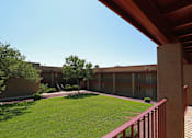 Thumbnail 5 of 22 - a courtyard viewed from an apartment patio