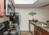 Thumbnail 13 of 29 - Upscale Stainless Steel Appliances at Butterfield Apartments, Flagstaff, AZ 86004