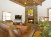 Thumbnail 21 of 29 - Fireplace Lounge at Butterfield Apartments, Flagstaff, AZ 86004