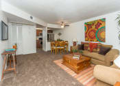 Thumbnail 9 of 29 - Living Room With Dining Area at Butterfield Apartments, Flagstaff AZ 86004