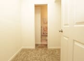 Thumbnail 17 of 22 - walk-in closet with a view toward a private bathroom