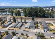Thumbnail 22 of 34 - arial view of a subdivision with a river in the background