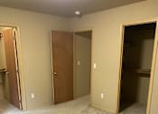 Thumbnail 76 of 82 - A wall-mounted air conditioner unit is installed in a room.