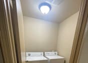 Thumbnail 60 of 82 - A white appliance is installed in a wall.